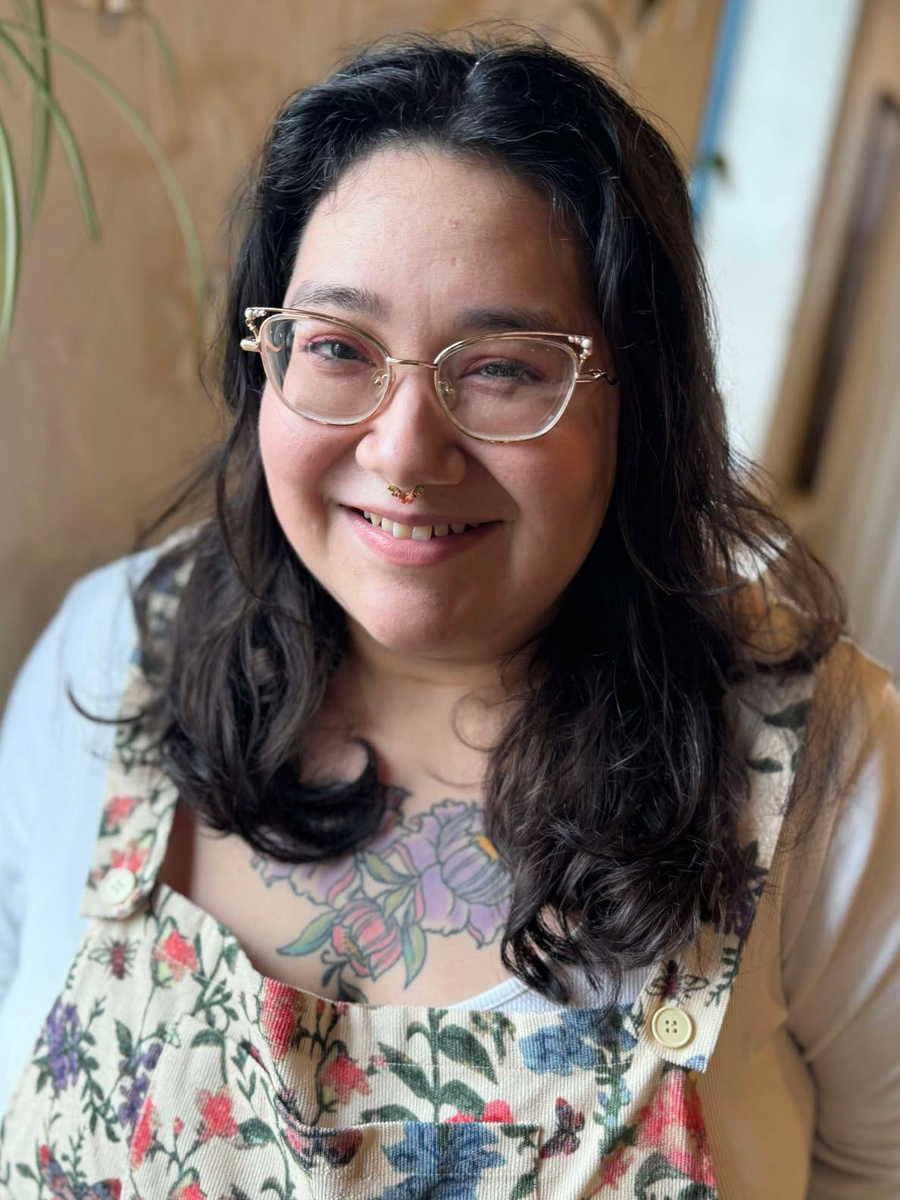 image of a woman wearing floral overalls