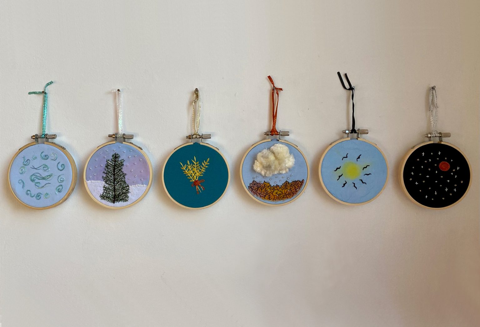 a group of embroideries