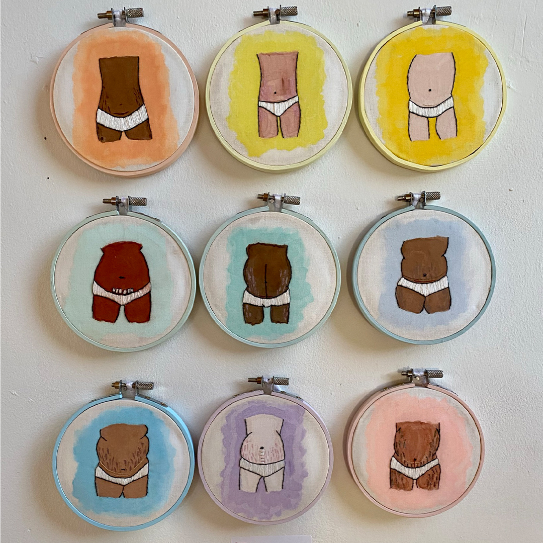 embroideries of torsos with c section scars