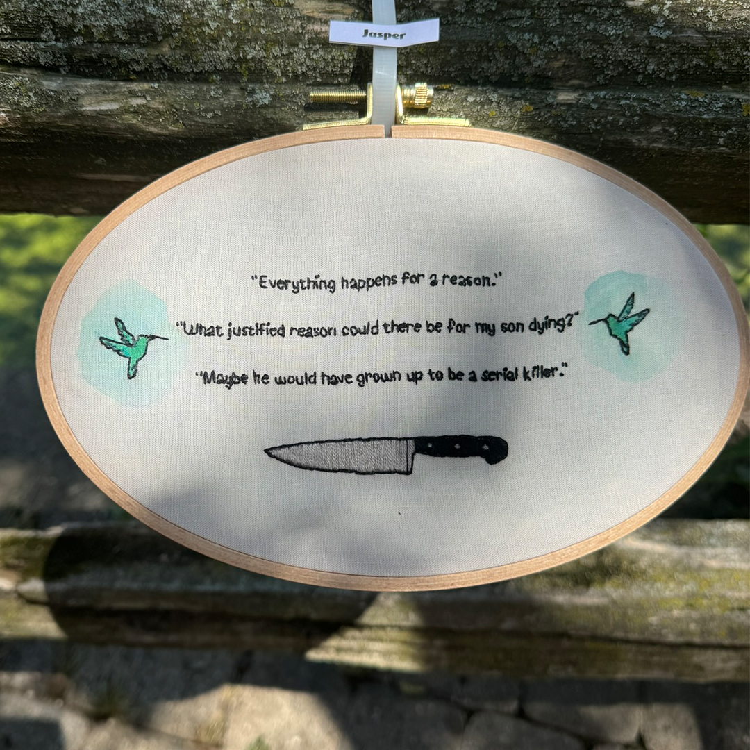 embroidery of a knife and words